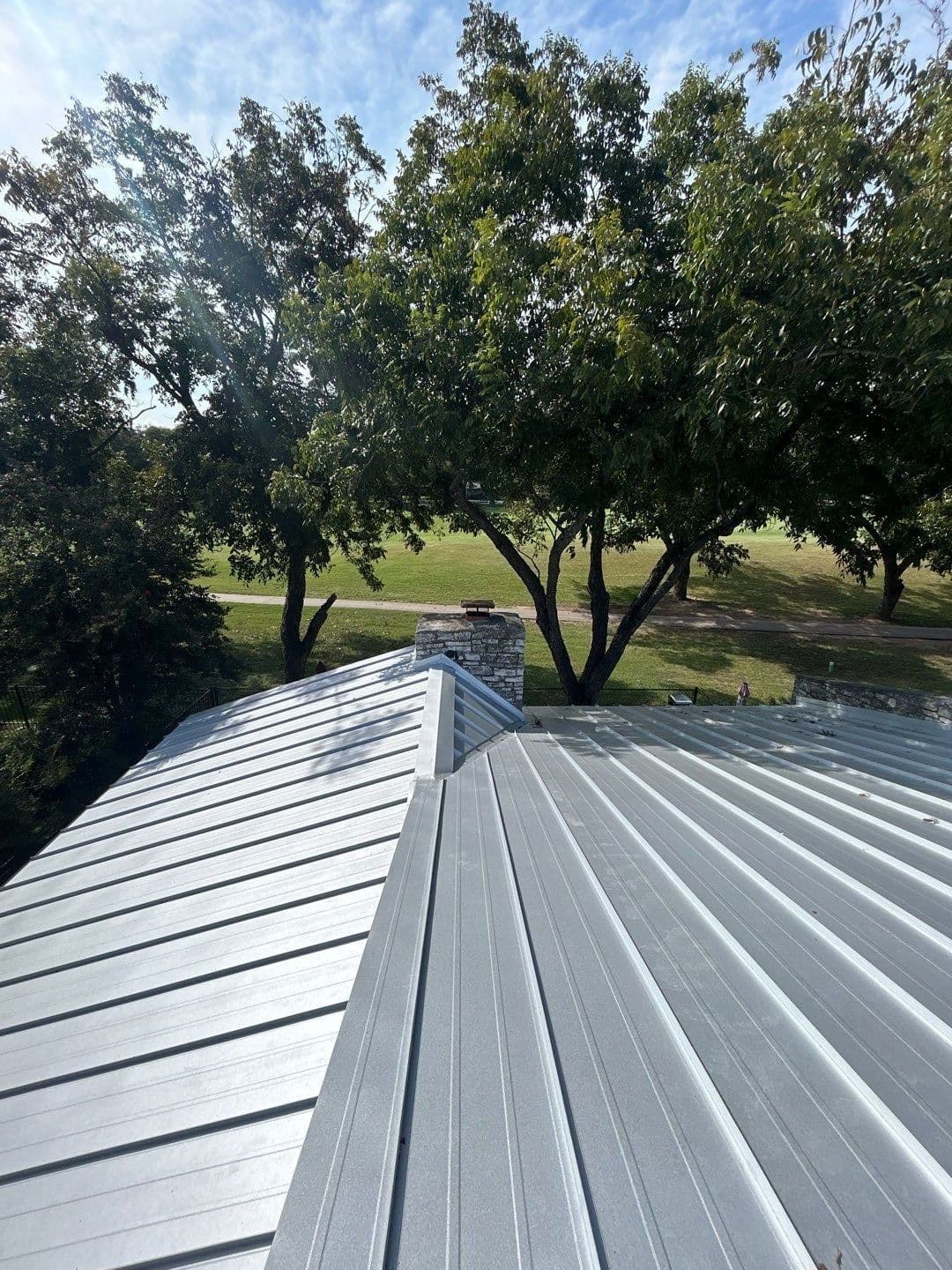 Gallery photos for Standing Seam Metal and TPO Combo Roof in Meadowlakes: Image #3